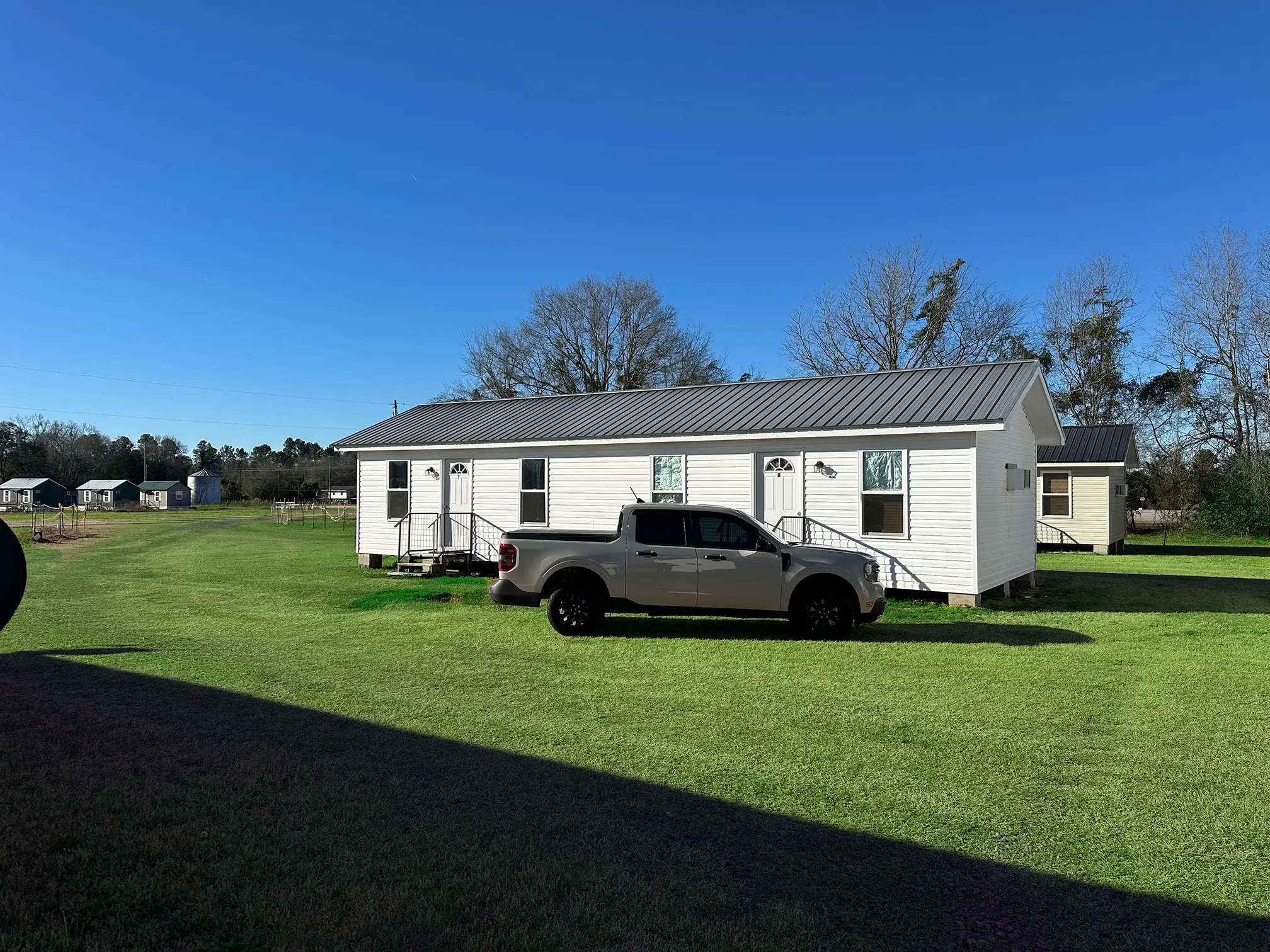 Row of modern rental cabins at Vogtle Ranch