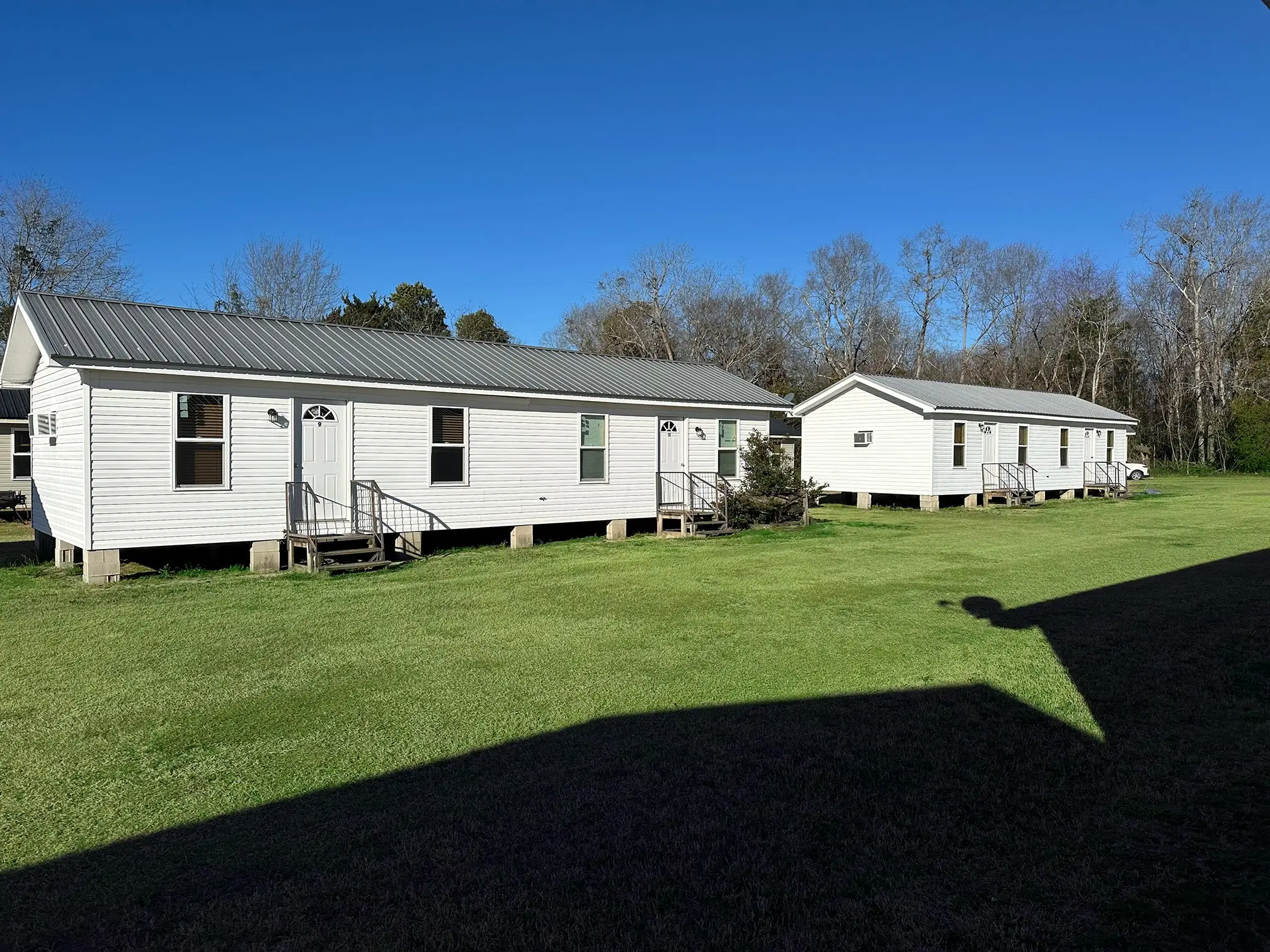 Cabin exteriors under blue Georgia skies
